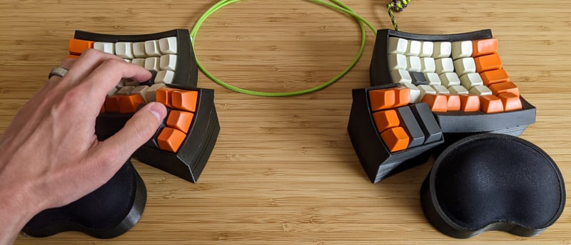 A keyboard with concave key wells (Dactyl Ergodox).